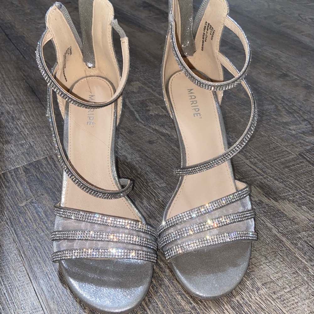 maripé silver heals, never worn, new with box, size 6